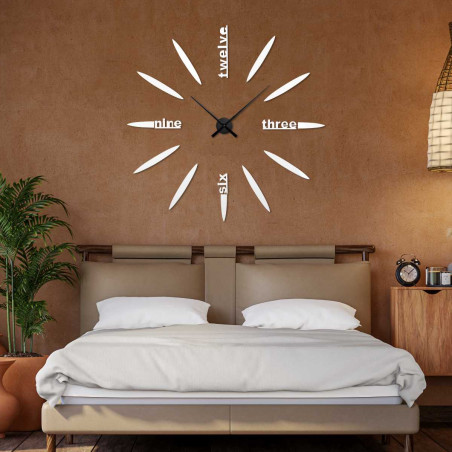 Originální nástěnné hodiny s minimalistickým uspořádáním a trojrozměrným designem. Originální nástěnné hodiny s minimalistickým uspořádáním a trojrozměrným designem.