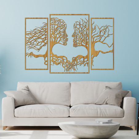 Třídílný obraz zobrazuje propojení mezi člověkem a přírodou, kde stromy a lidské tváře harmonicky splývají.